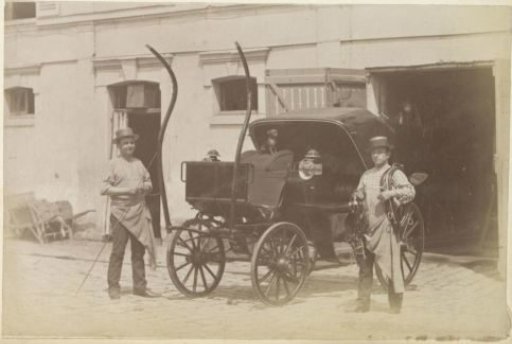 Two Men and a Carriage at a Coach House in France