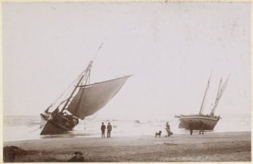 Sailing boats aground, probably on the French coast