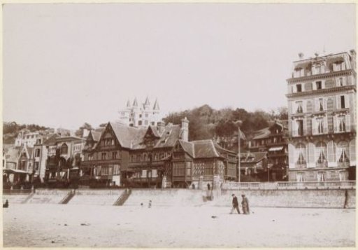 View of country houses and a castle on (probably) the French coast