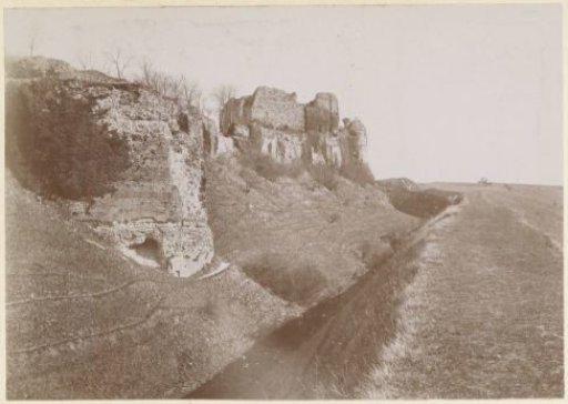 Ruin near an earthen rampart, probably in France