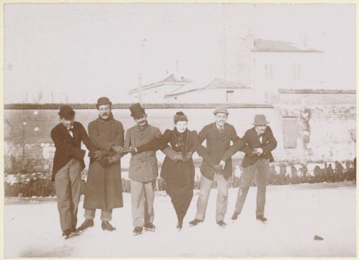 Group skating hand in hand, probably in France