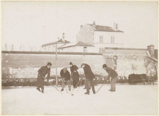 Group playing ice hockey, probably in France