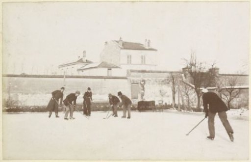 Group playing ice hockey, probably in France
