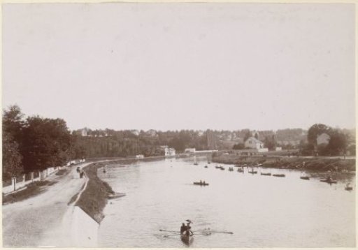 View of a river with boats, probably in France