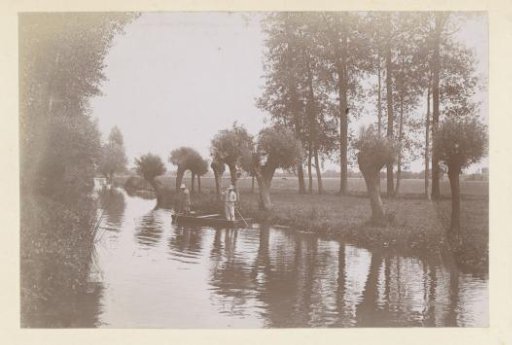 Men on a boat, probably in a ditch in France