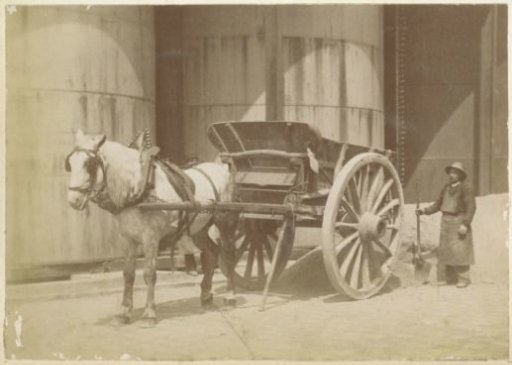 Horse and carriage and a soldier at a barracks in France