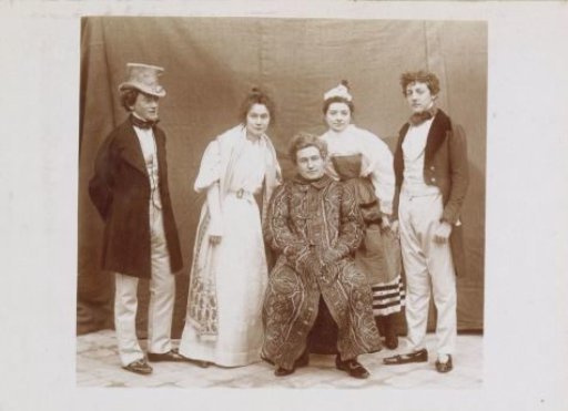 Group portrait of a company in historical costumes, probably French amateur actors