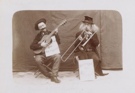 Two musicians with plates bearing inscriptions, probably French amateur actors