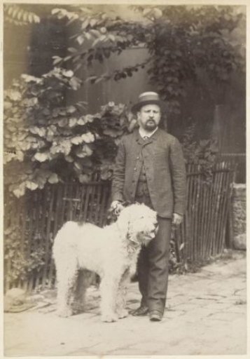 Portrait of a man with a dog in France