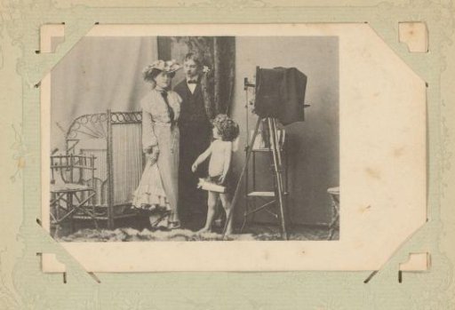 Man, woman and child in a photography studio