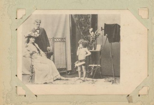 Man, woman and child in a photography studio