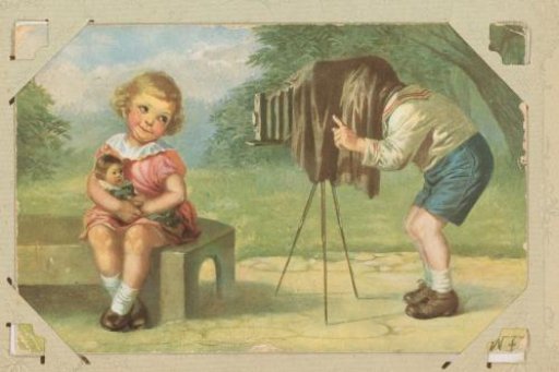 Boy making a portrait of a girl with a doll