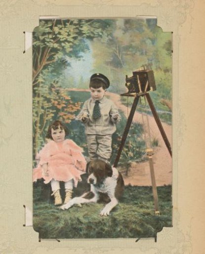 Boy and girl with a dog and camera