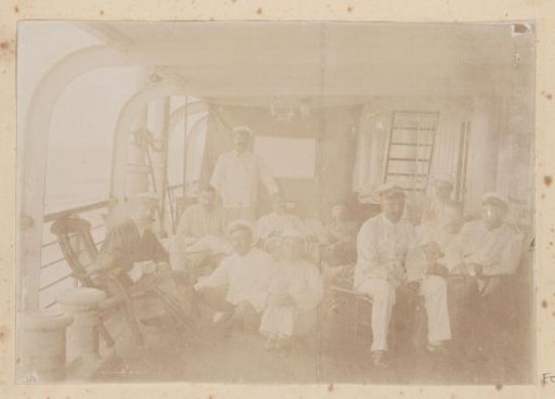 Group of men in uniform on board a ship