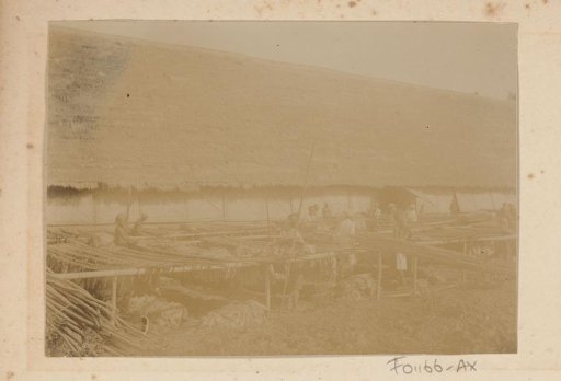 Construction work next to a barn