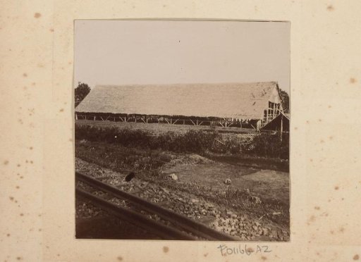 Barn next to railway tracks