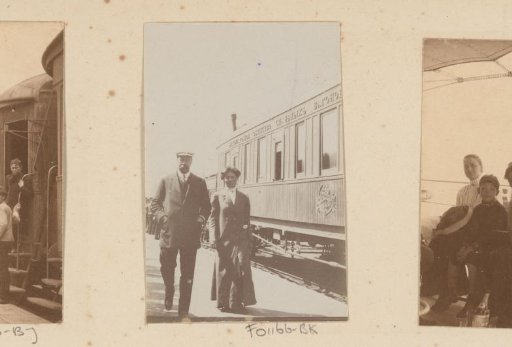 Man and woman on the platform by a train