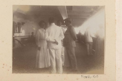 Woman and men on deck of a ship