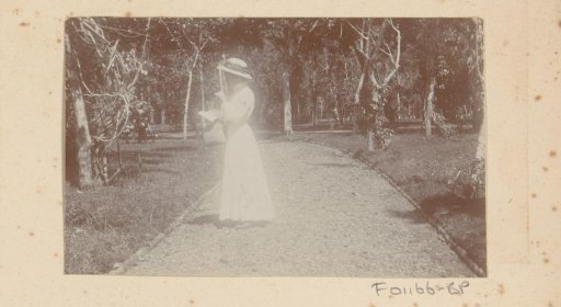 Dutch woman on a path in a park