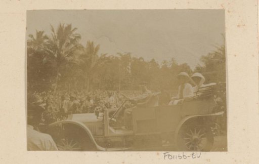 Dutch East Indies, Dutch people in a car with Indonesians around them