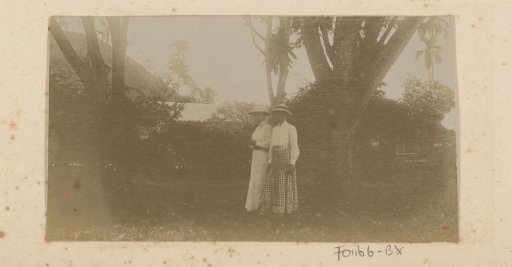 Two Dutch women in a garden