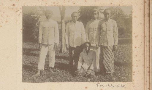 Dutch East Indies, group portrait of Indonesian men and women