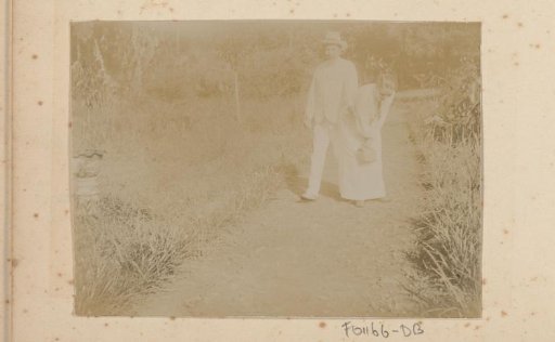Man and woman on a garden path