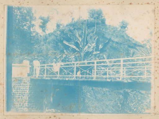 Dutch men and women in a cart on a bridge