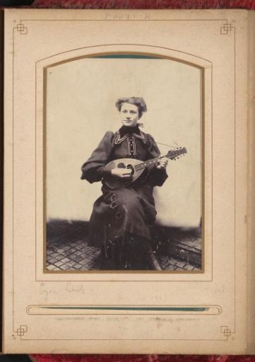 Portrait of a seated woman with mandolin