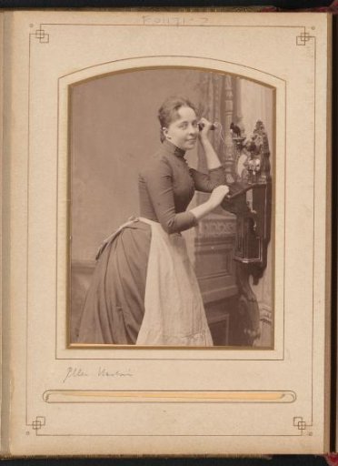 Portrait of Ellen Hartman with telephone