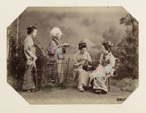 Group portrait of four Japanese women with tea service