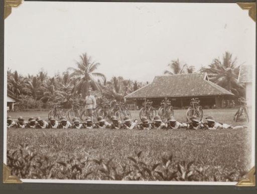 Group of police officers in shooting stance in Lampong (lying)