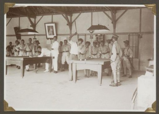 Police officers playing billiards in Lampong