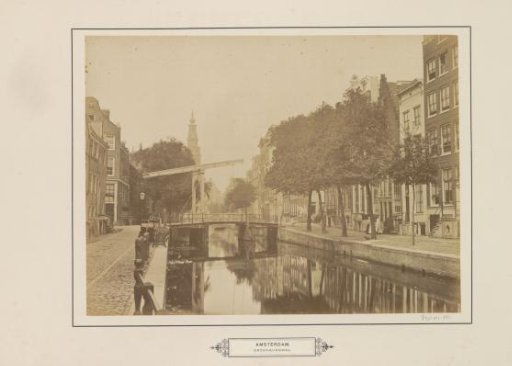 View of the Groenburgwal with the bridge in the Staalstraat and the tower of the Zuiderkerk
