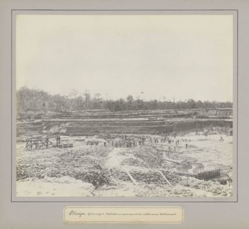 View of a tin mine with miners in Belinyu