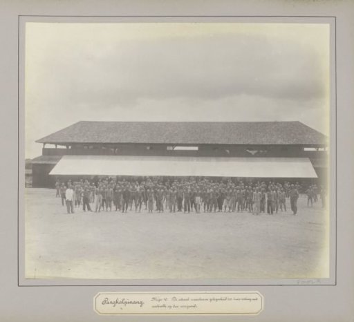 Workers of a tin mining company at Pangkalpinang in front of a barrack