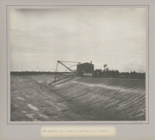 Excavator in a tin mine at Sungailiat