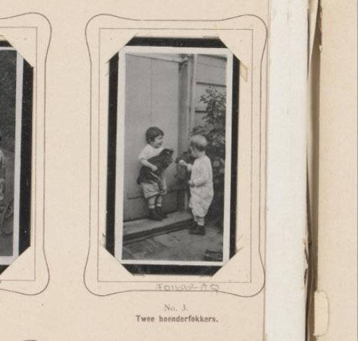 Two children with a chicken