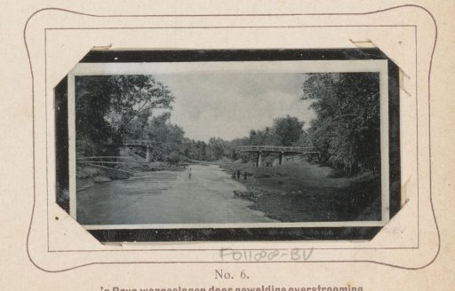 View of a River with a Collapsed Bridge