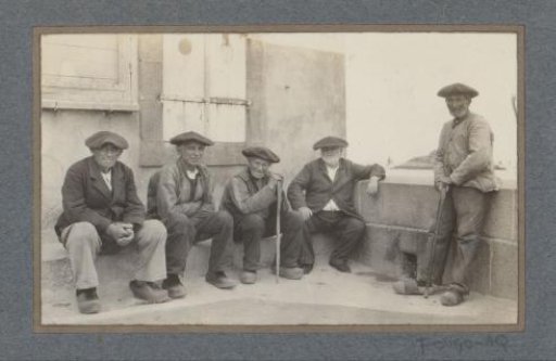 Five old men with caps