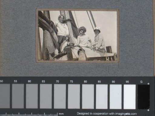 Three children on a sailboat