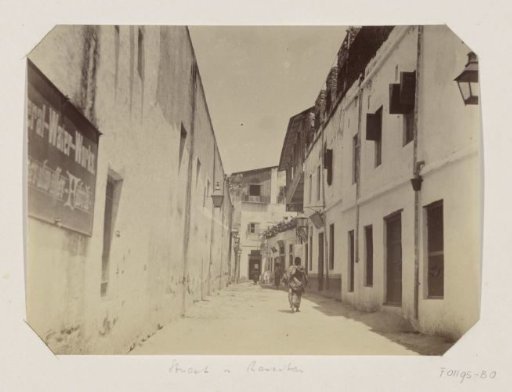 Passers-by in a street in Zanzibar