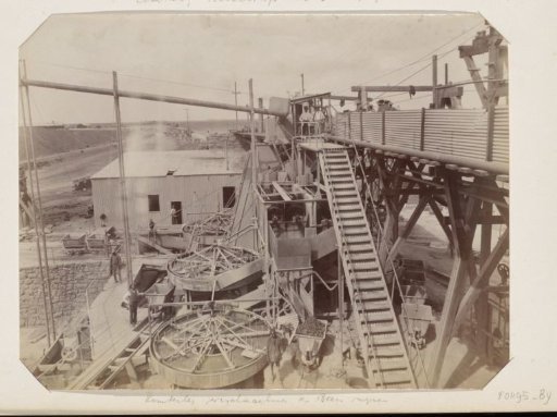Workers at work at the washing plant of the De Beers mines in Kimberley