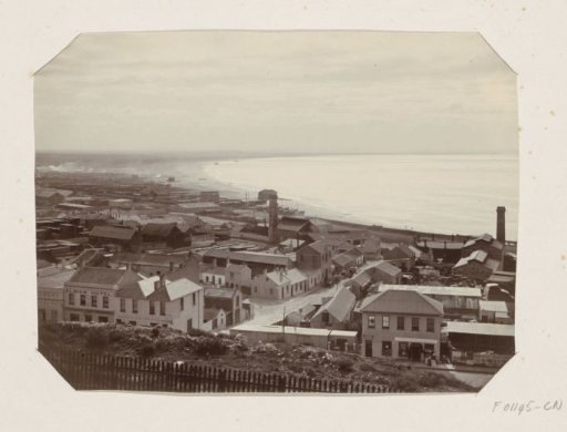 City with industry by the sea, presumably in South Africa