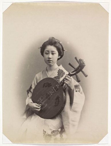 Portrait of a Japanese girl with a musical instrument