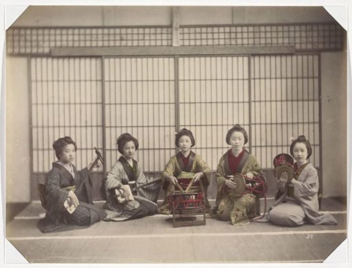 Japanese girls making music with string and percussion instruments