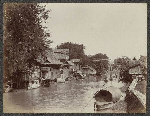 Village on a waterway in Siam
