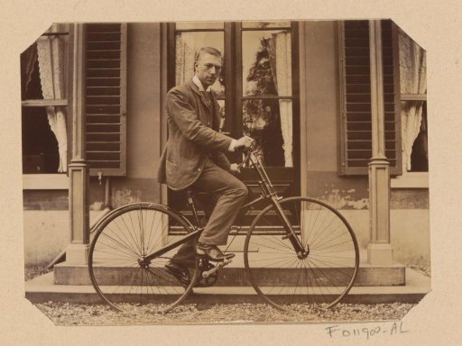 Portrait of an unknown man on a bicycle