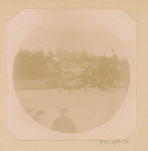 Carriage on a country road, possibly near Arnhem, with the photographer's shadow in the foreground