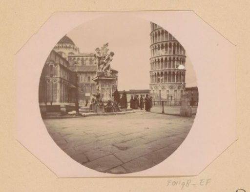 View of the fountain on Piazza dei Miracoli in Pisa with on the left the cathedral and on the right the Leaning Tower of Pisa